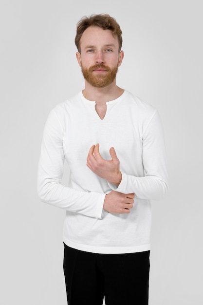 Free photo man wearing white shirt medium shot