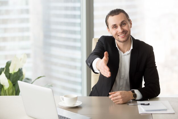 Man welcomes business partners on negotiations