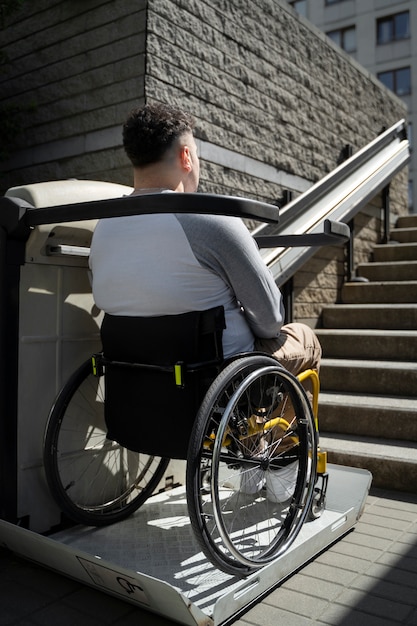 Man in wheelchair side view