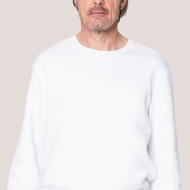 Man in white sweater casual apparel with design space close up