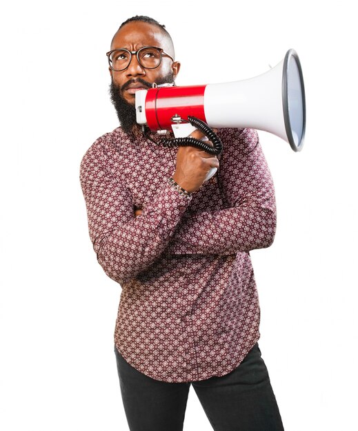 Man with arms crossed and megaphone