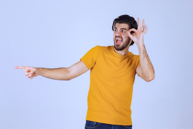 Man with beard showing circle ok sign