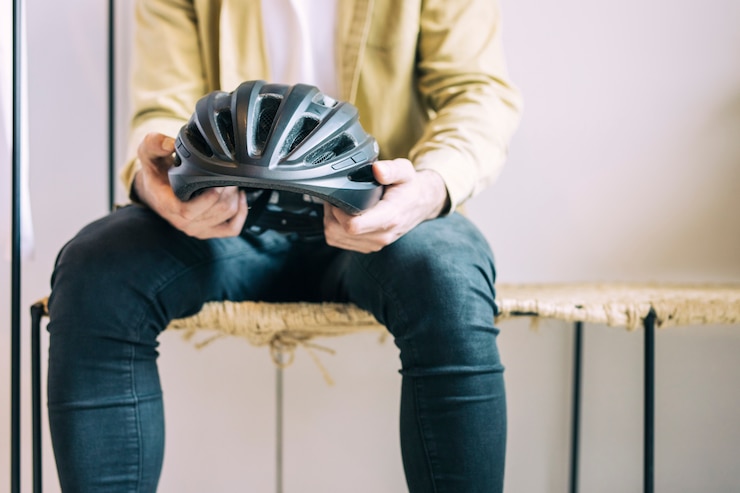 Free Photo man with bike helmet