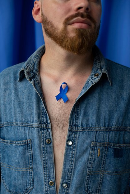 Man with blue november ribbon