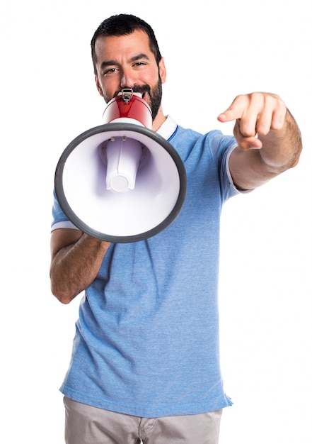 Free photo man with blue shirt shouting by megaphone