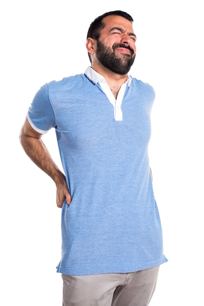 Foto gratuita uomo con camicia blu con dolore alla schiena