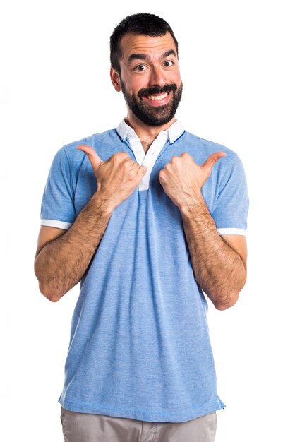 Man with blue shirt with thumb up