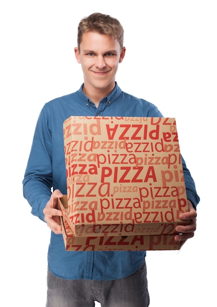 Man with boxes of pizza