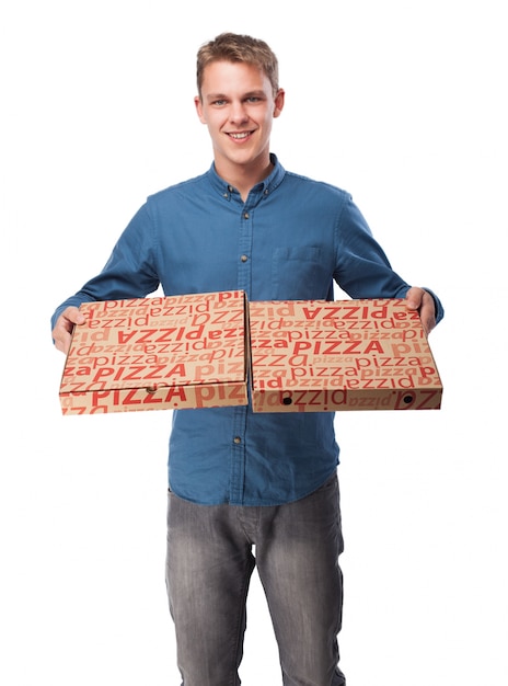 Man with boxes of pizza