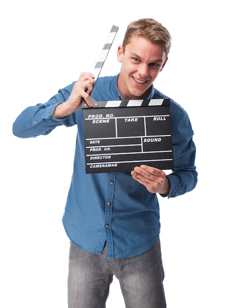 Free photo man with a clapperboard