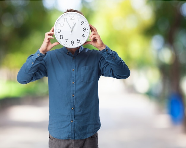 Man with a clock on his face