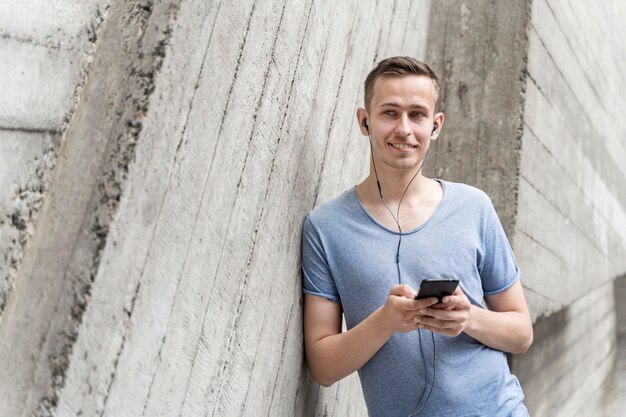 Man with earphones listening music