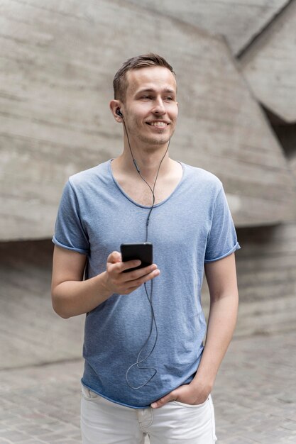 Man with earphones and mobile