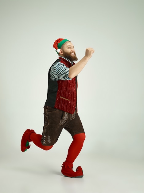 Man with elf costume isolated on white