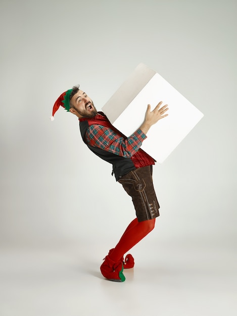 Man with elf costume isolated on white