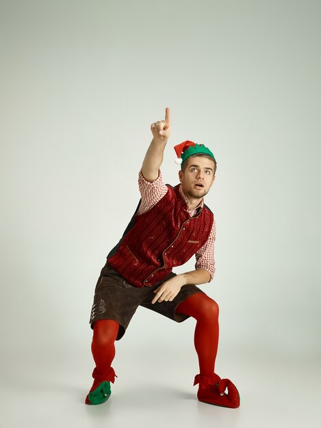 Man with elf costume isolated on white