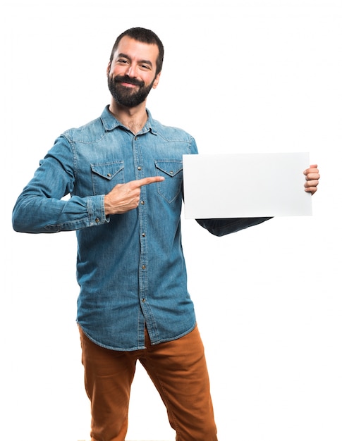 Free photo man with empty placard