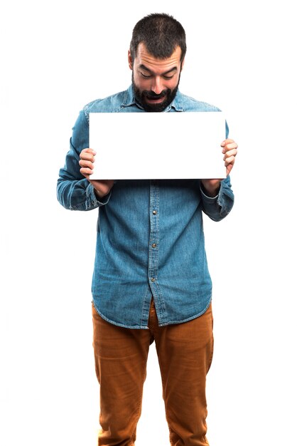 Man with empty placard