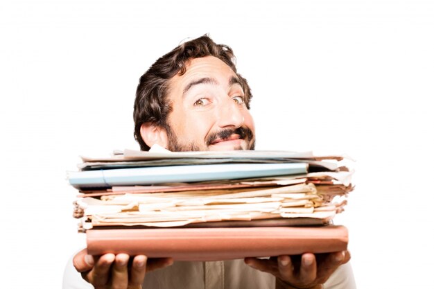 Man with a filing cabinet and a stack of papers