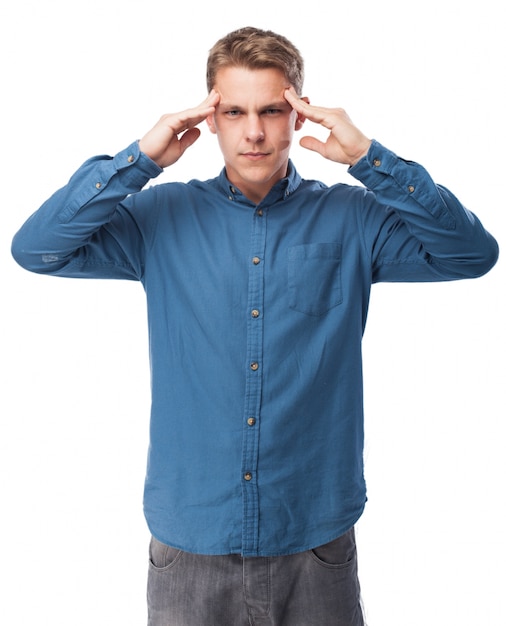 Man with fingers on the temples