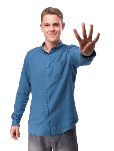 Man with four raised fingers