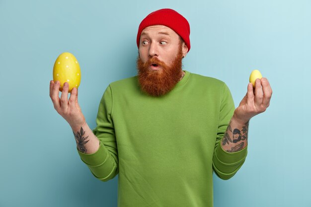 Man with ginger beard wearing colorful clothes