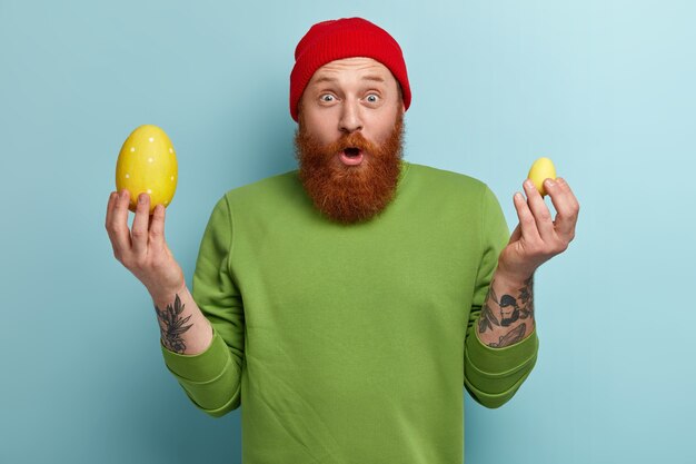 Man with ginger beard wearing colorful clothes