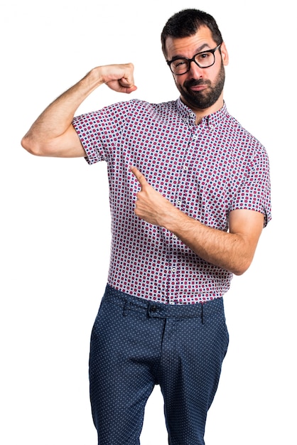 Man with glasses making strong gesture