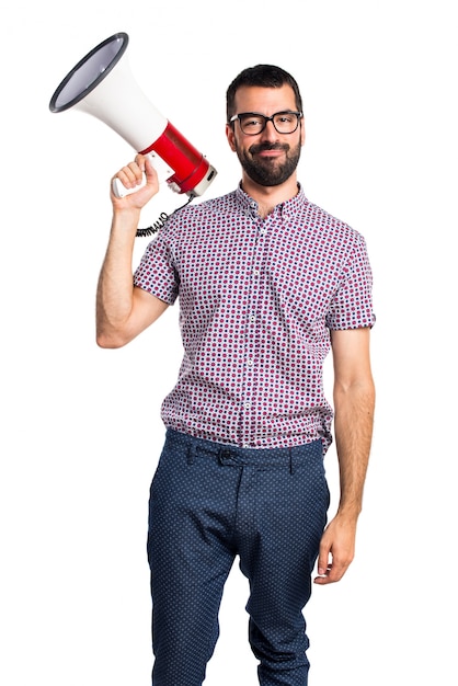 Free photo man with glasses shouting by megaphone