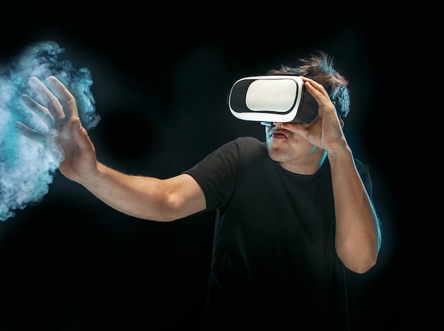 The man with glasses of virtual reality. Future technology concept.