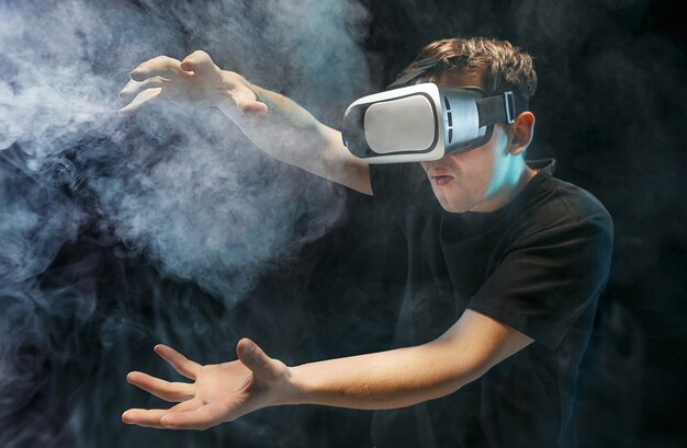 The man with glasses of virtual reality. Future technology concept.