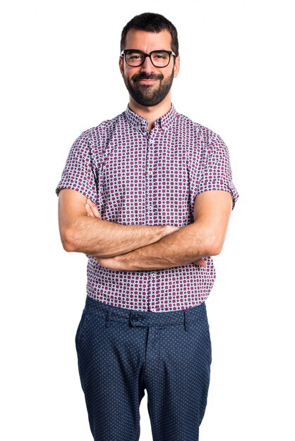 man with glasses with his arms crossed