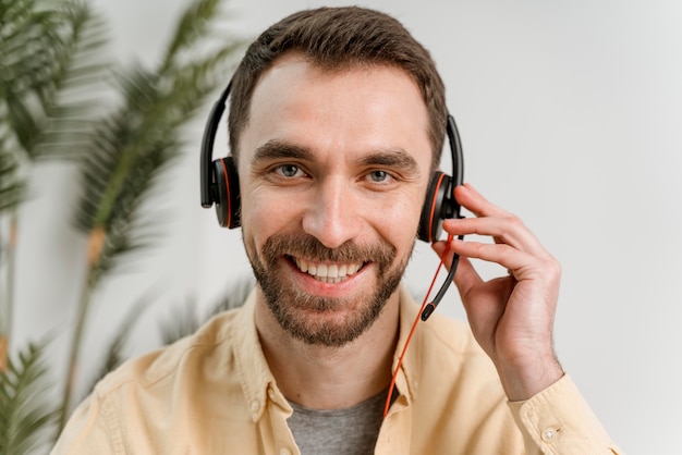 Man with headset having video call