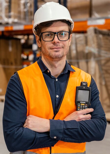 Man with helmet in warehouse