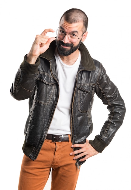 Man with leather jacket doing tiny sign