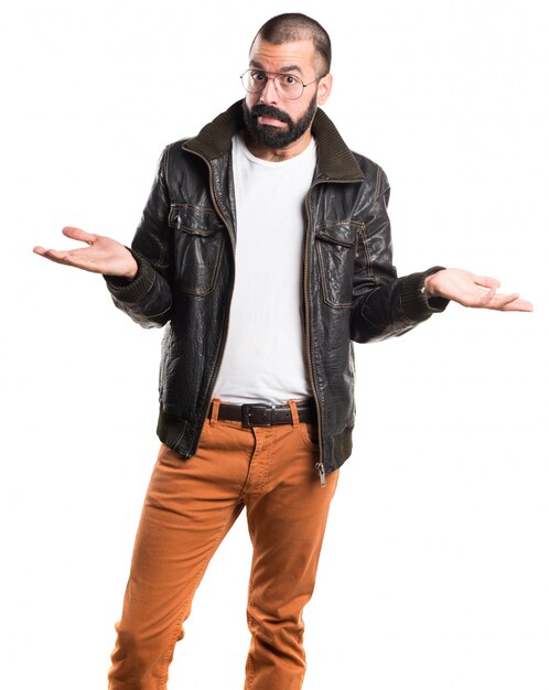 Man with leather jacket making unimportant gesture