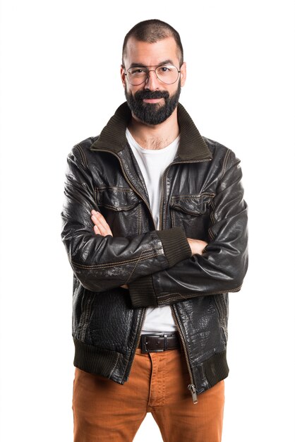 Man with leather jacket with his arms crossed
