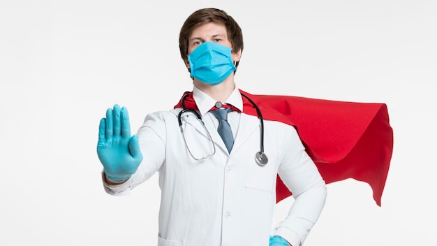 Free photo man with medical mask and protection glove