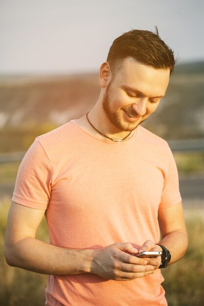 Man with mobile phone. Retro vintage instagram filter