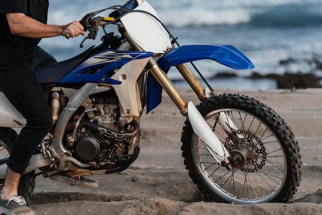 Man with motorcycle in hawaii close up