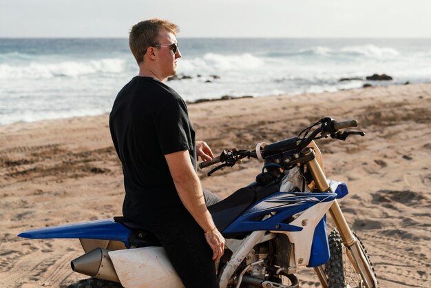 Man with motorcycle in hawaii