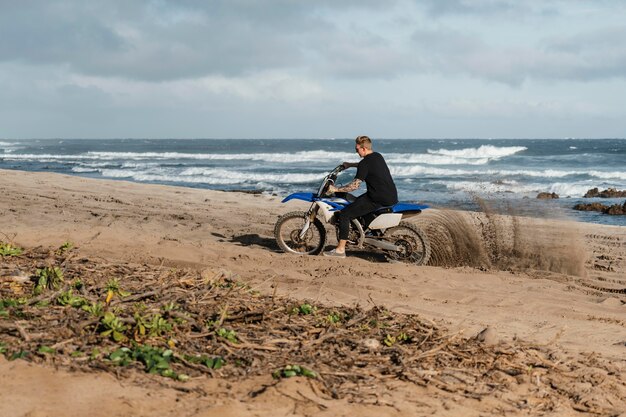 Man with motorcycle in hawaii