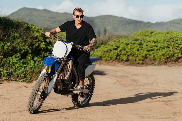 Man with motorcycle in hawaii