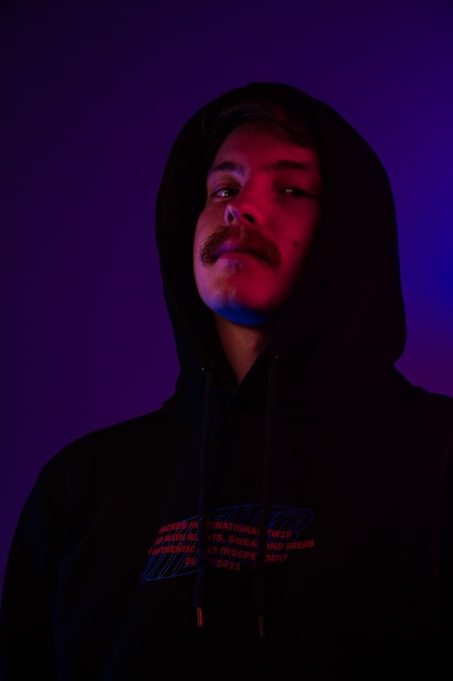 Man with mustache wearing hoodie