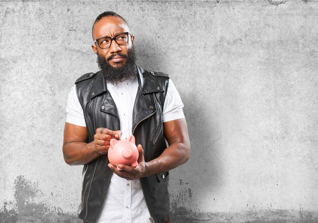 Man with pig piggy bank