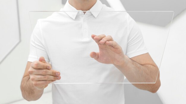 Man with plastic board close up