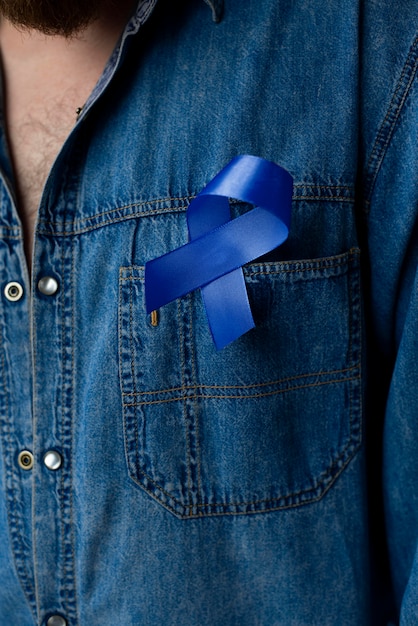 Free photo man with prostate cancer ribbon