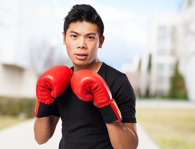 Man with red boxing gloves