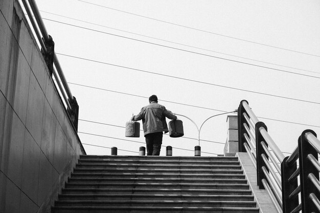 Man with round bags