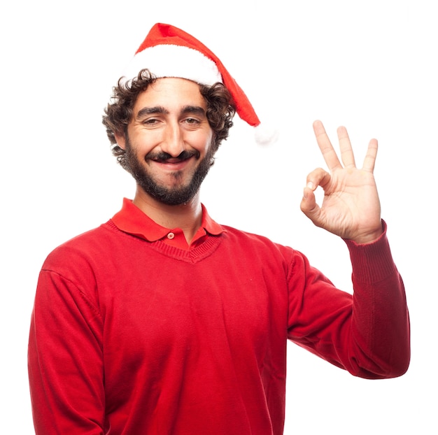 Man with santa's hat saying ok